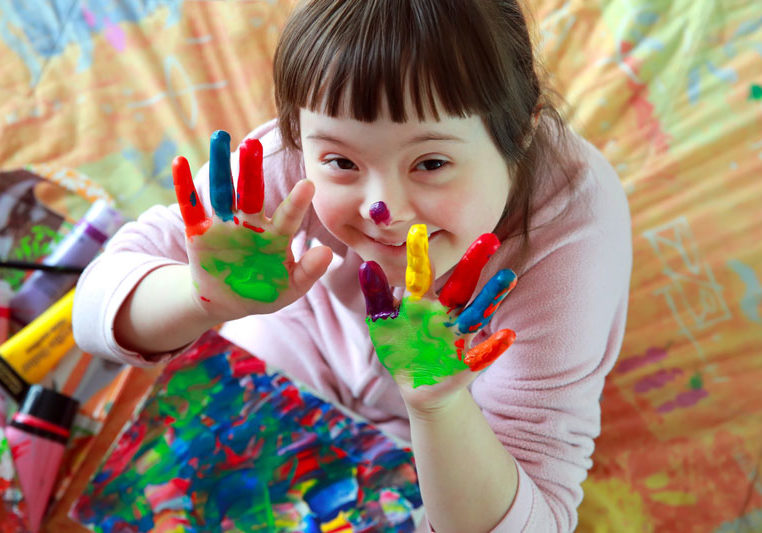 Little-girl-with-paint-on-her-fingers
